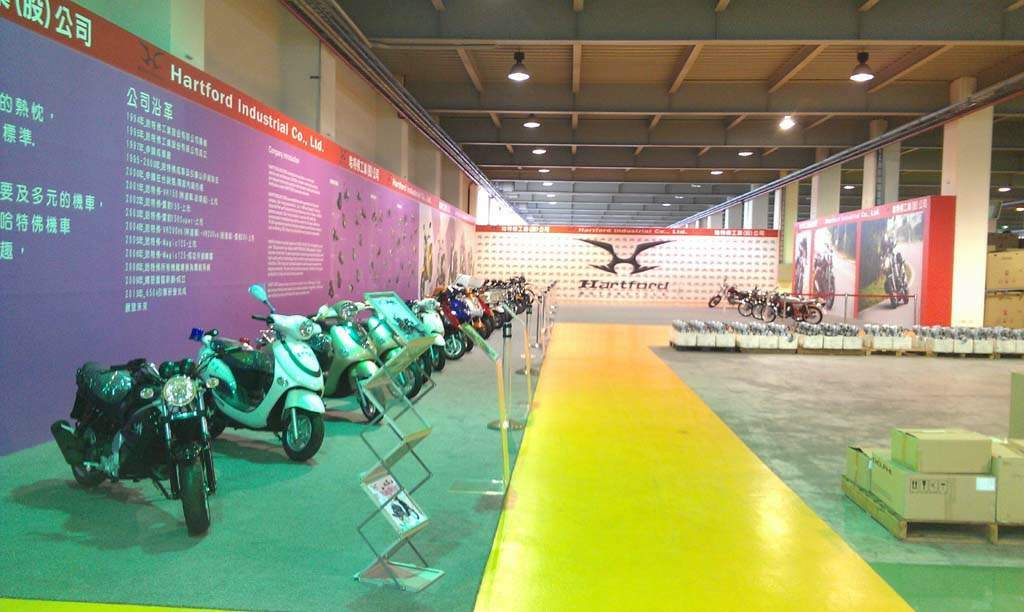 A row of motorcycles and scooters at a Hartford showroom in Taichung city.